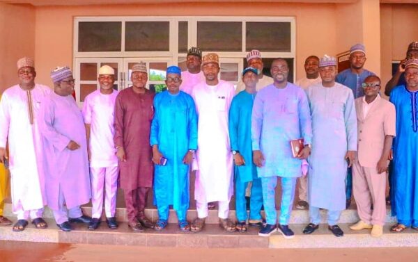 Nasarawa State House of Assembly Committee on Urban Development in a group picture with Engr. Mohammed Wada Yahaya, the Managing Director of NUDB and others