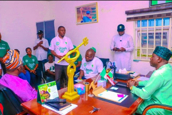 Chairman, House Committee on Environment and member representing Keana Constituency, Hon. Mohammed Adamu Omadefu listening to Africa's activists on Climate Change Justice who came to honour him at his office State Assembly complex, Lafia