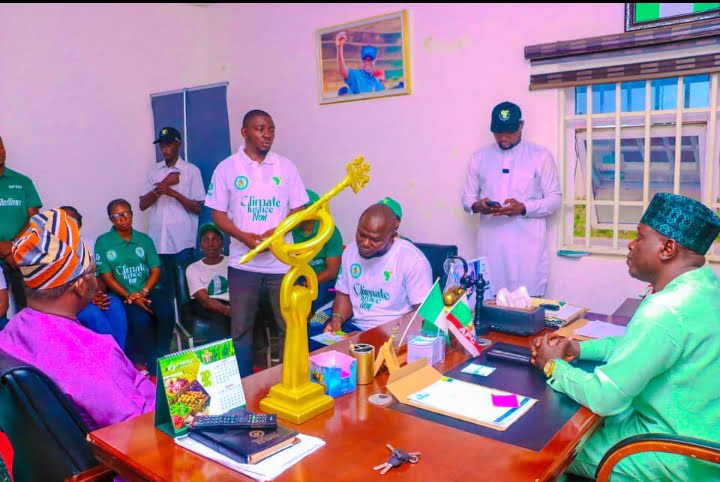 Chairman, House Committee on Environment and member representing Keana Constituency, Hon. Mohammed Adamu Omadefu listening to Africa's activists on Climate Change Justice who came to honour him at his office State Assembly complex, Lafia