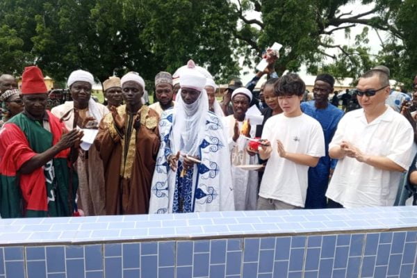 The president of Hopes for Well (HW) Mr Kenneth Wang alongside the Chief of Wako during the commissioning of boreholes at GSS Dangara on Monday