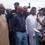 FCT minister Nyesom Wike, Senator Philip Aduda and chairman of Gwagwalada area council, Alhaji Abubakar Jibrin during tej the ministers inspection of Paiko-Ibwa road on Monday.