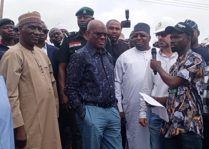 FCT minister Nyesom Wike, Senator Philip Aduda and chairman of Gwagwalada area council, Alhaji Abubakar Jibrin during tej the ministers inspection of Paiko-Ibwa road on Monday.
