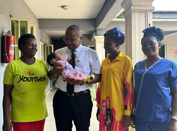 Hon. Collins Ugochukwu Iheonunekwu, lawmaker representing Isiala Ngwa North (M) with mother and others