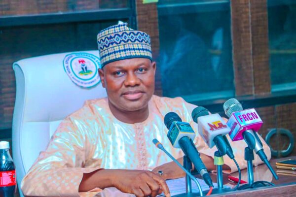 Nasarawa State House of Assembly Speaker, Rt. Hon. Danladi Jatau in a group photograph with 13 LG Legislators and their principal of