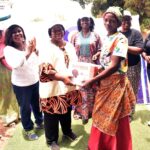 The National Vice President, Women in Renewable Energy -Associations (WIRE-A)Dr. Anita Adeyemi making a presentation to one of the recipients of the Cookstoves at the occasion. Lined up behind her (from left to right)are: National Secretary- Rashida Mahmood, FCT Coordinator - Dr. Adetoun Dally, Kaduna State Coordinator - Vivienne Uzo Iyiegbu, South East Regional Coordinator - Hon. Bridget Obi and Head of Clean Cookstoves- Chibuzor Chidozie .M