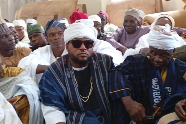 The former FCT PCC commissioner Hon Ezekiel Musa Dalhatu (m) after he turbaned as the (Santurakin of Rubochi) by the Sa'Rubochiyi of Rubochi chiefdom HRH Alhaji Ibrahim Mohammed Pada in his palace on Saturday.