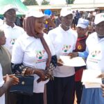 The Abaji area council chapter chairman of the YPP Hon Alhassan Suleiman right present letter to the organizing secretary of the party Mohammed Nadaba, shortly after his inauguration in Abaji on Saturday.