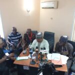 Chairman of the electoral committee of the PDP chairmanship primaries Hon Chris Hassan,(m) while declaring the results at the state party's office in Abuja on Monday.