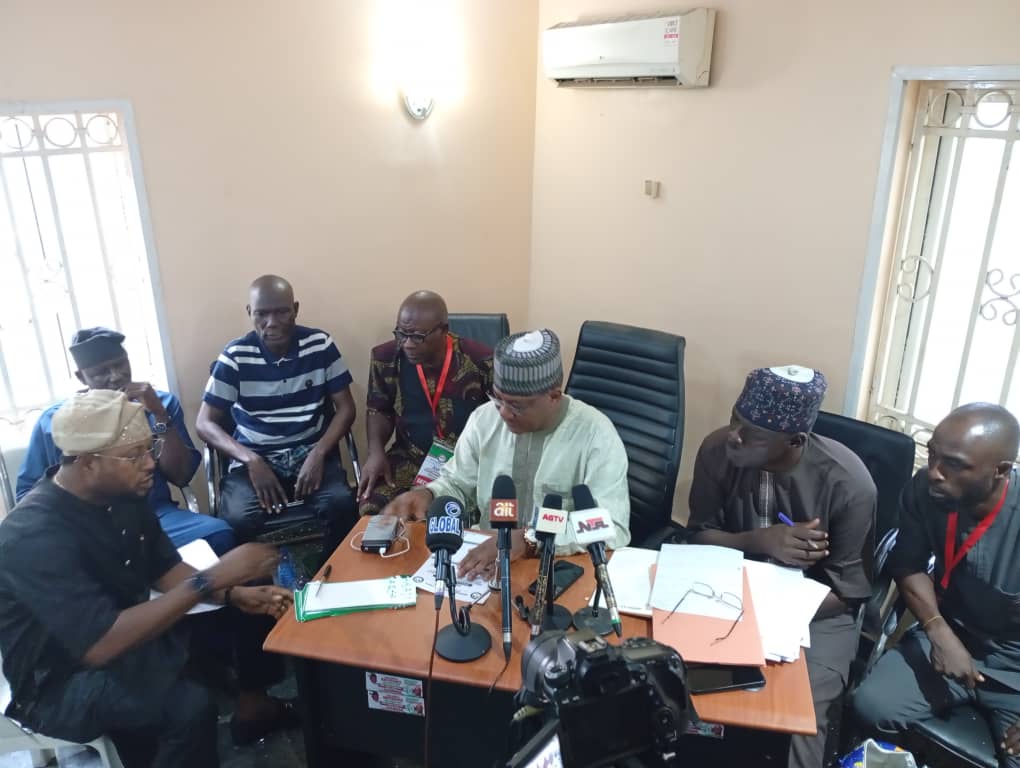 Chairman of the electoral committee of the PDP chairmanship primaries Hon Chris Hassan,(m) while declaring the results at the state party's office in Abuja on Monday.