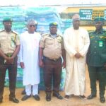 The Commissioner for security and Sundry matters, Usman Baba In a photograph during the presentation of 500 mattresses to Keffi correctional service.