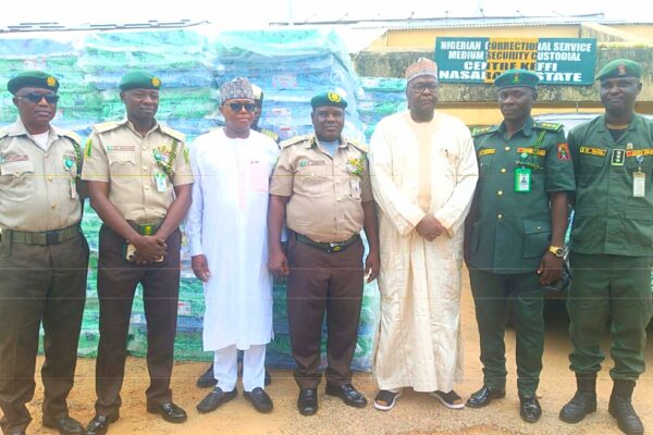 The Commissioner for security and Sundry matters, Usman Baba In a photograph during the presentation of 500 mattresses to Keffi correctional service.