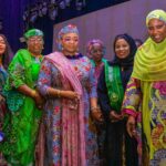 AWTPN National Chairman, Tpl. Rekiyat Ahuoiza Fache in a photograph with the Hon. Minister of Women Affairs, Hajiya Imaan Sulaiman Ibrahim and other dignitaries in Abuja