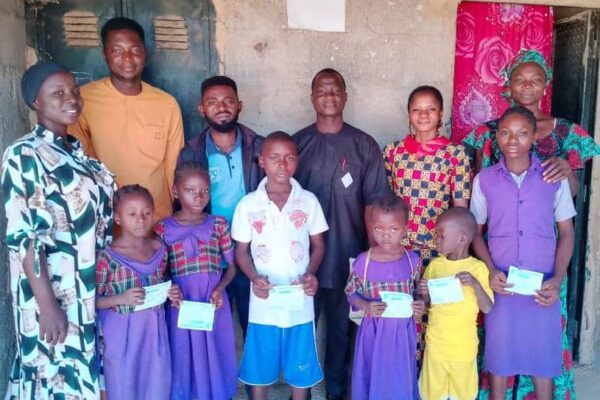 The 6 orphans during the awarding of scholarship