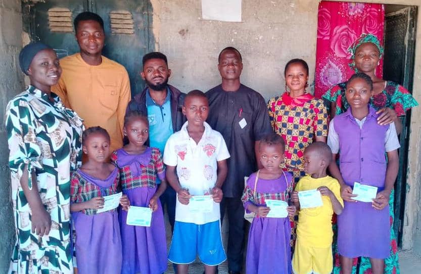 The 6 orphans during the awarding of scholarship