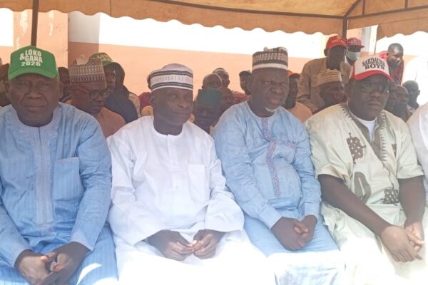 YPP chairman Alhaji Alhassan Suleiman present flag to former speaker of Abaji during his defection to YPP on Tuesday.