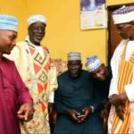 The Gwagwalada PDP chairmanship Comrade Mohammed Kasim Ikwa (m) seated during his visit to seek royal blessing at the palace of the Agora of Zuba chiefdom HRH Alhaji Mohammed Bello Umar on Wednesday.