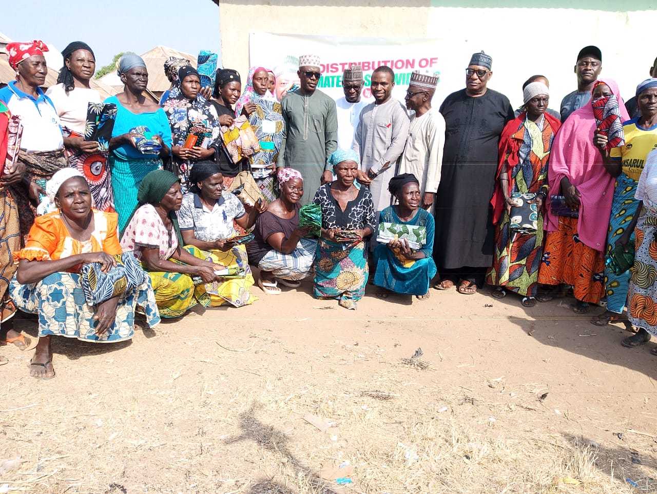 Mr. Theophilus Peter Ewu in a group photograph with other dignitaries and beneficiaries.