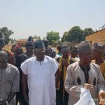 Mr. Rice Ahmed with community members during the commissioning of two boreholes.