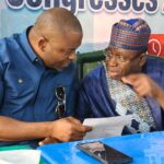 Kuje Chairman -elect Hon Samuel Danjuma Shekwolo with Senator Usman Jibrin Wowo during the inauguration of the LG APC executives on Thursday.