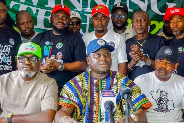 Ogah Mark Okpanachi middle during press briefing
