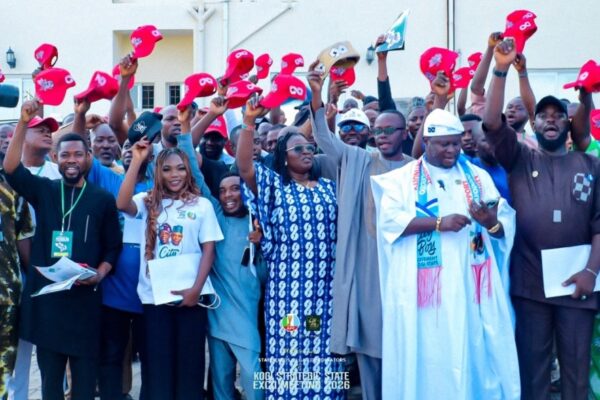 Hon. Ogah Mark Okpanachi and Hon. Jerry Olayemi with newly inaugurated City Boy Movement executives during the inauguration ceremony in Lokoja, Kogi State.