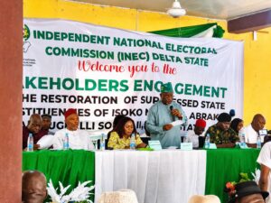 Delta State REC Sir Etekamba Udo Umoren addresses stakeholders during the INEC meeting on the restoration of three State Assembly constituencies in Asaba.