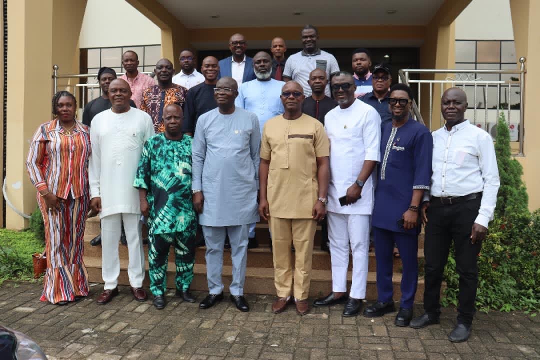 Professor Lawrence Omo-Aghoja presenting the Coalition of Academics' partnership proposal to Dennis Osadebay University Vice Chancellor Professor Samuel Ovuete Aghalino in Asaba.