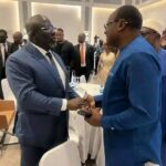Rep. Francis Ejiroghene Waive (R) exchange pleasantry with Delta State Governor Sheriff Oborevwori