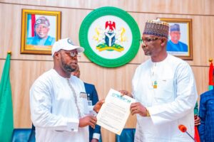 Chairman of youth coalition for Wadada Support Groups, Comrade Jaafar Muhammad Loko and Governor Abdullahi Alhaji Sule of Nasarawa State