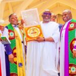 Funkekeme Solomon congratulates Governor Sheriff Oborevwori on his Christian Icon Award.